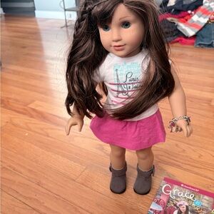 American Girl Doll with Pink Skirt and Brown Hair